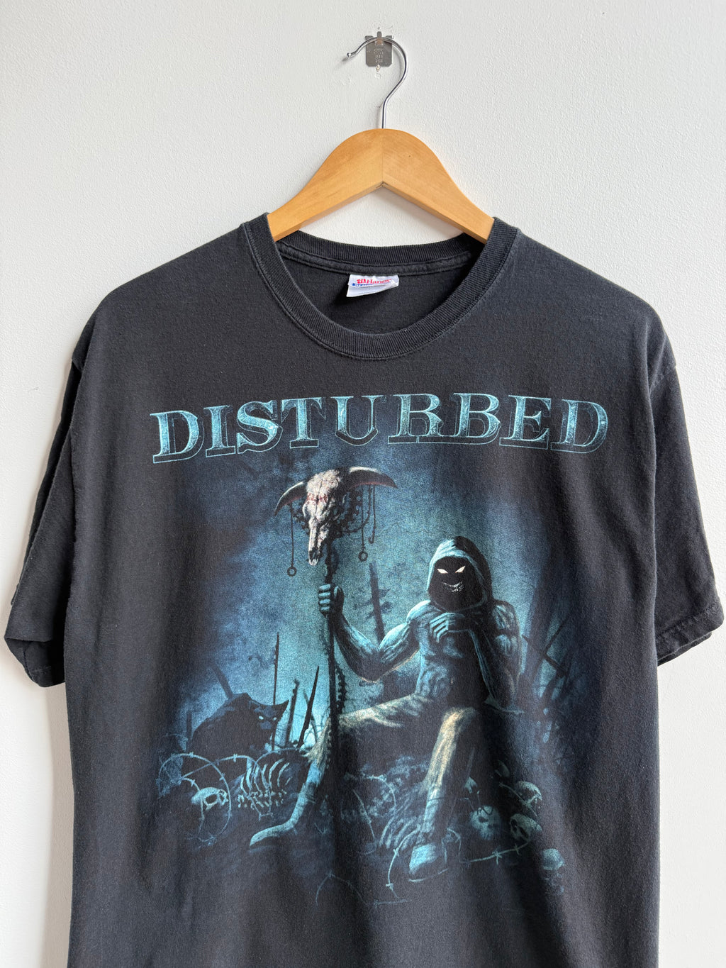 (L) Disturbed Tee