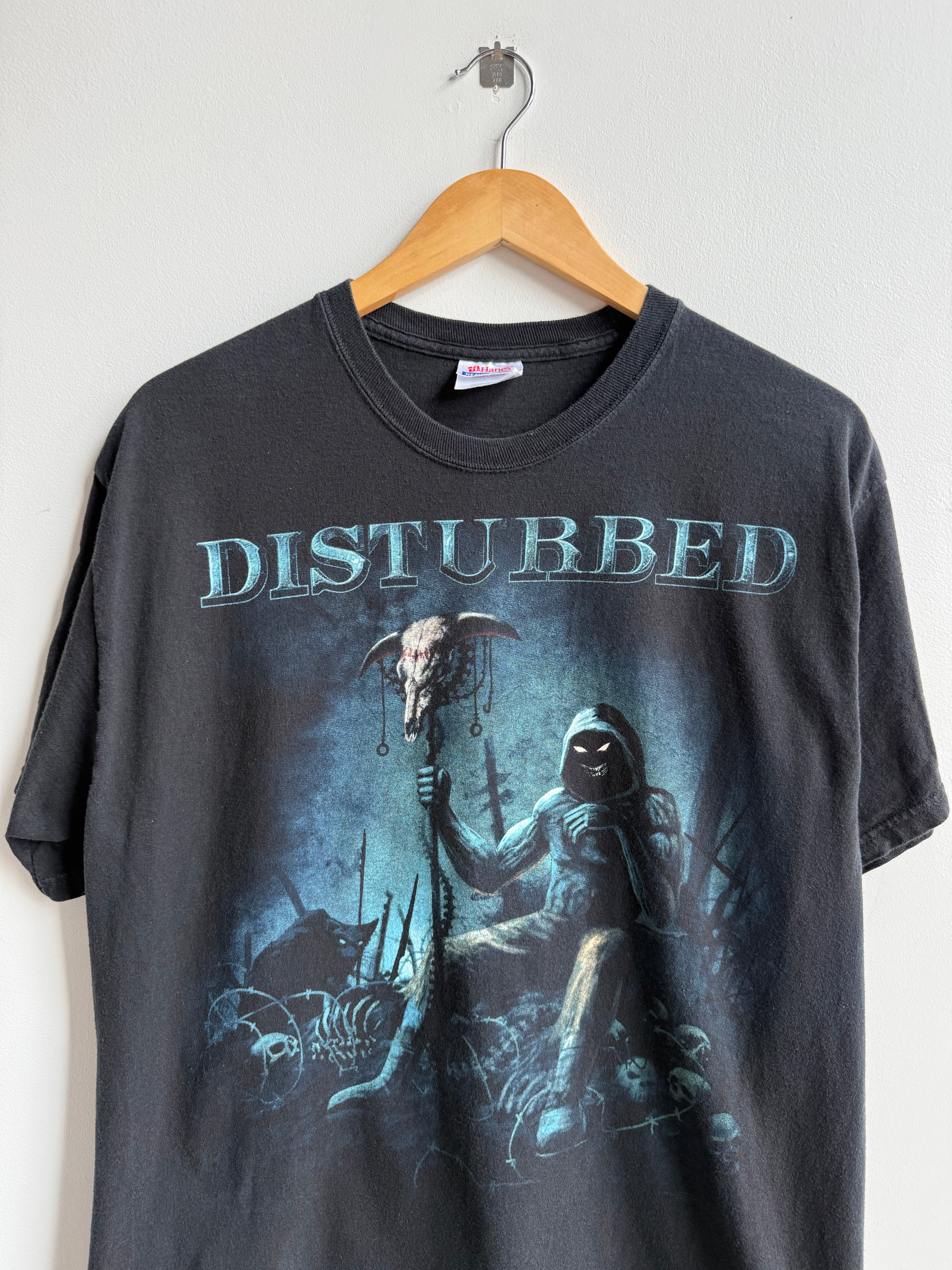 (L) Disturbed Tee