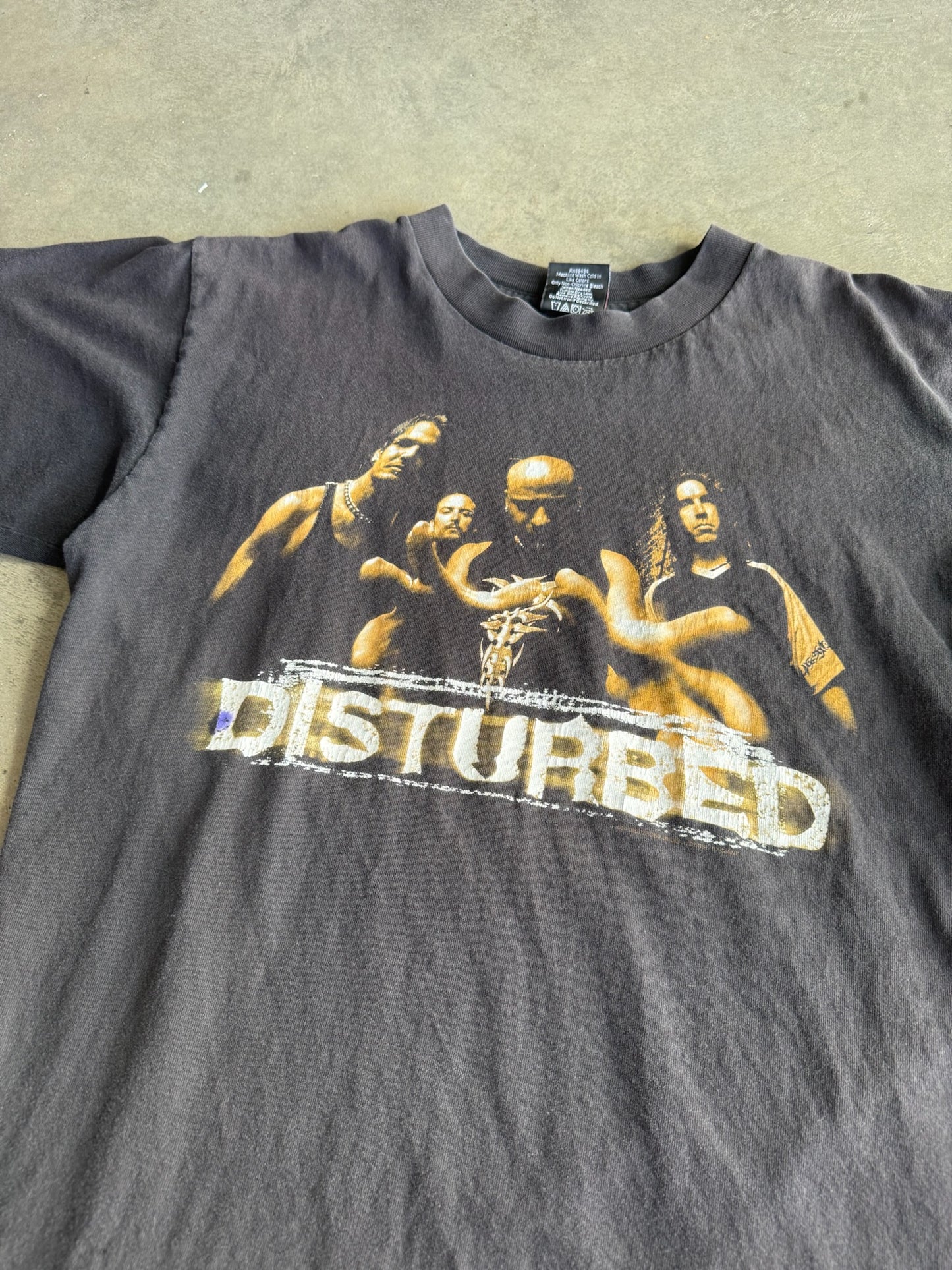 (L) Disturbed Tee