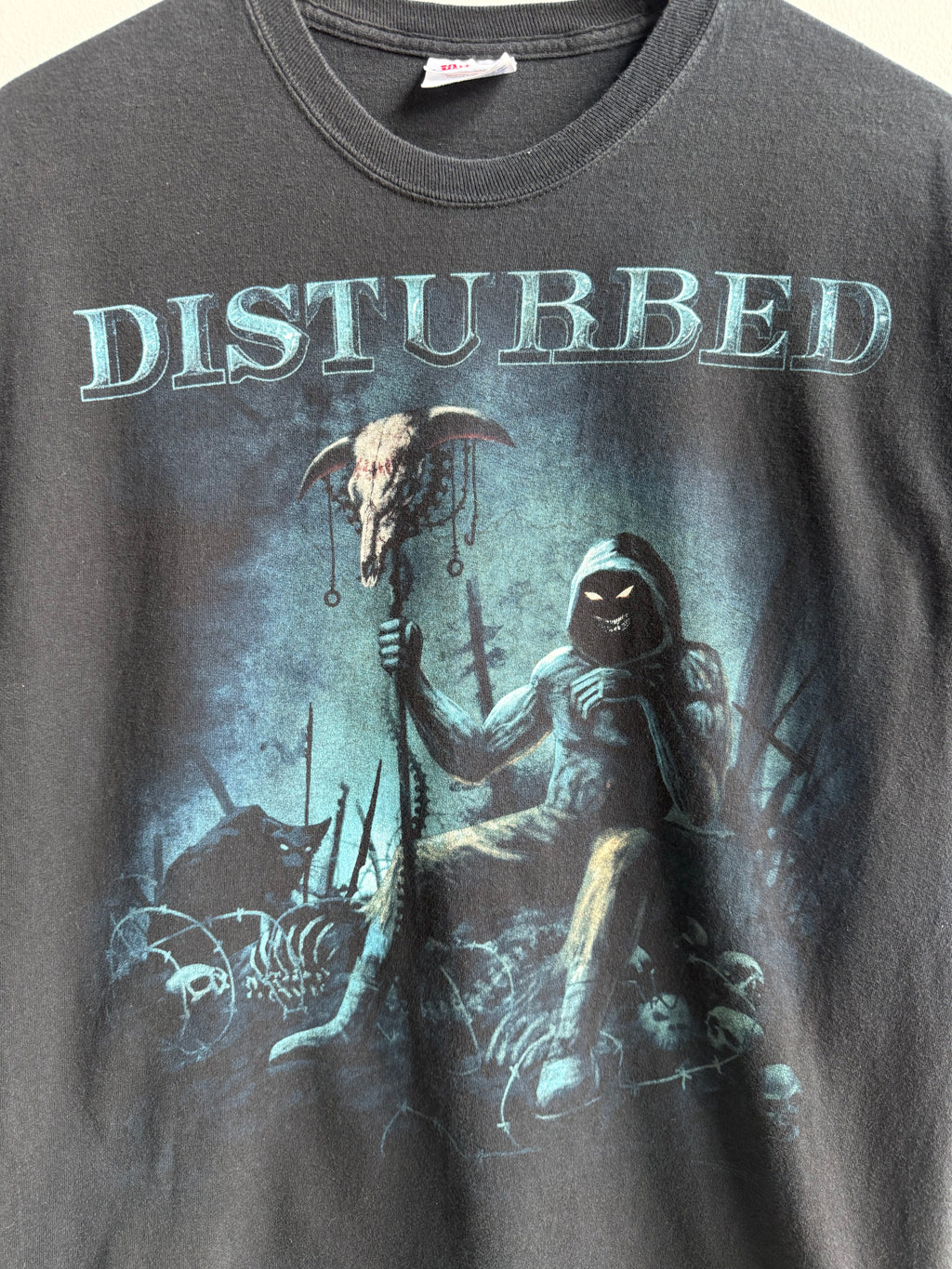 (L) Disturbed Tee