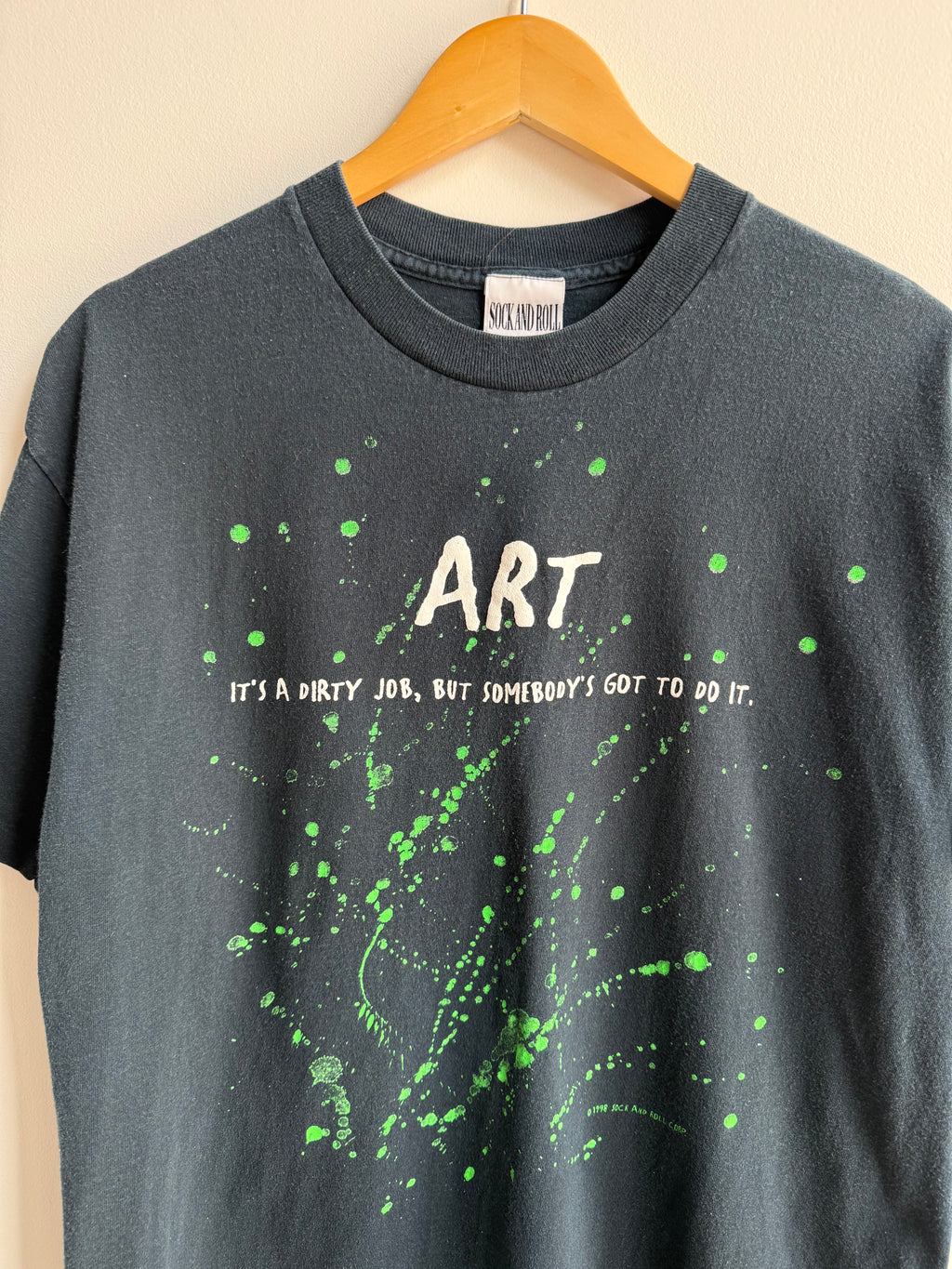 (L) Somebody’s Gotta Do It Art Tee