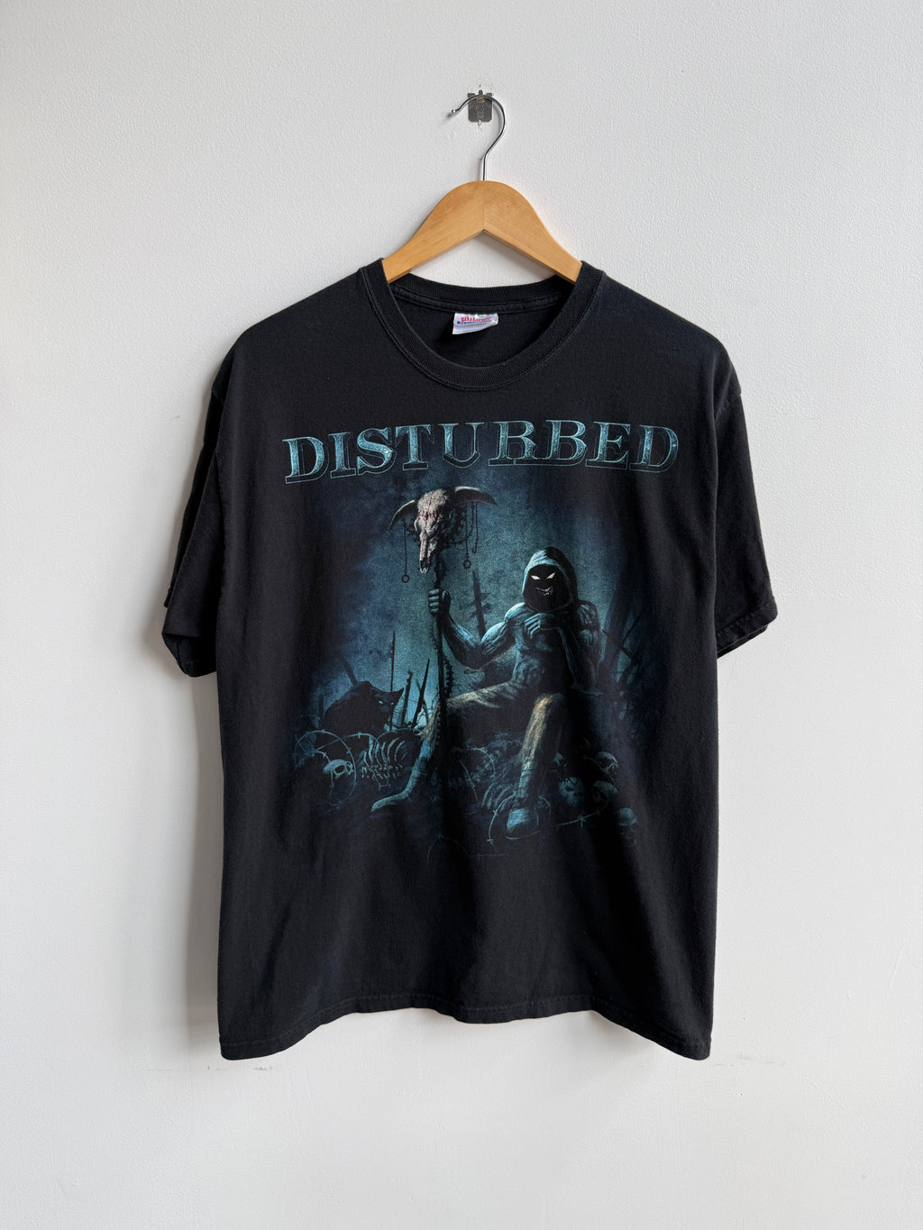 (L) Disturbed Tee