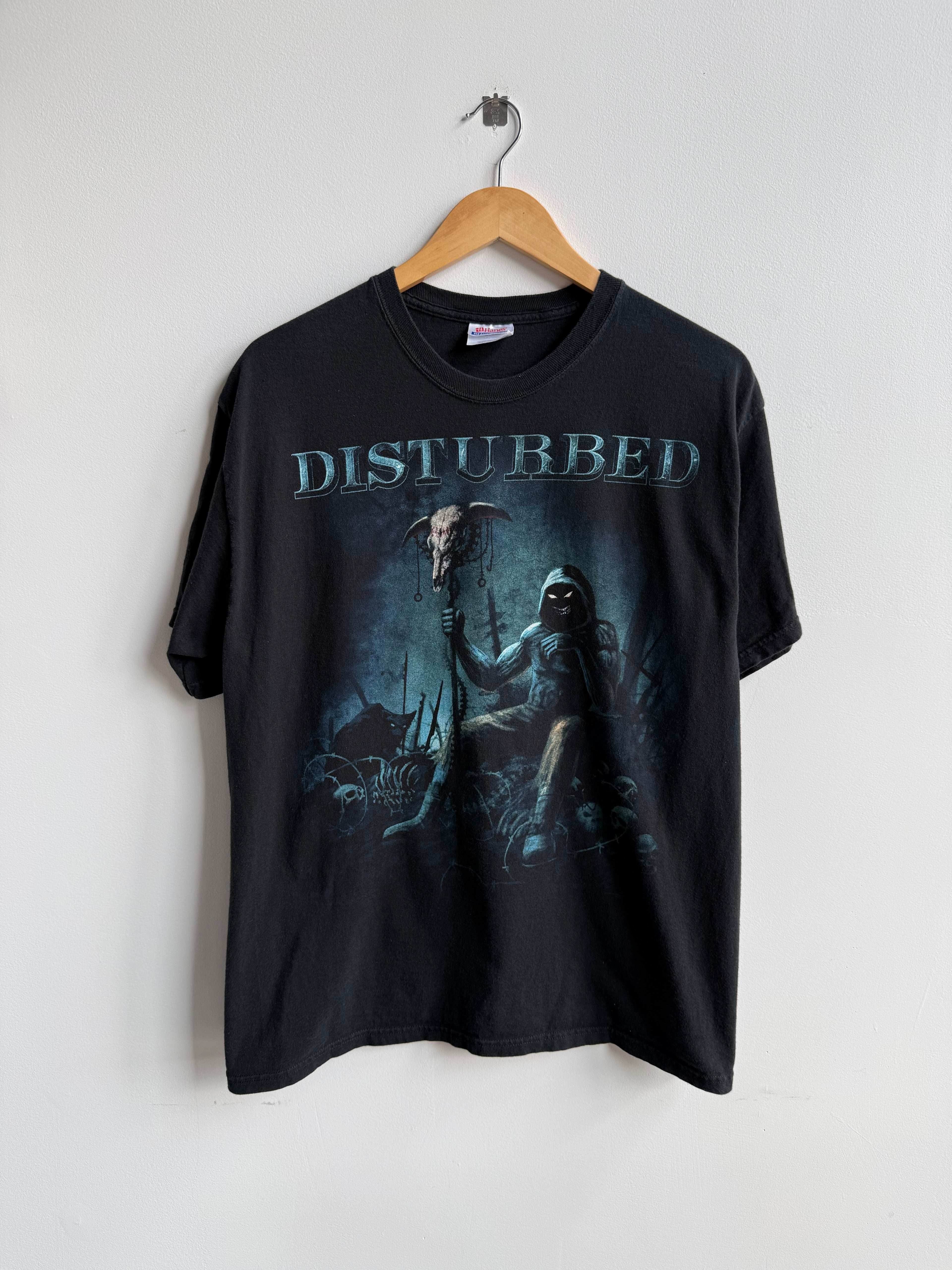 (L) Disturbed Tee